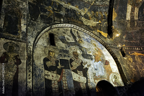 Ruined murals of the Church of the Dormition in Vardzia cave monastery in Georgia photo