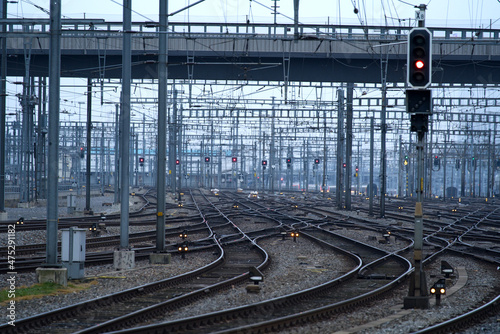 Track field with railway switches and railway signals at Zürich main railway station on a foggy winter morning. Photo taken December 15th, 2021, Zurich, Switzerland.