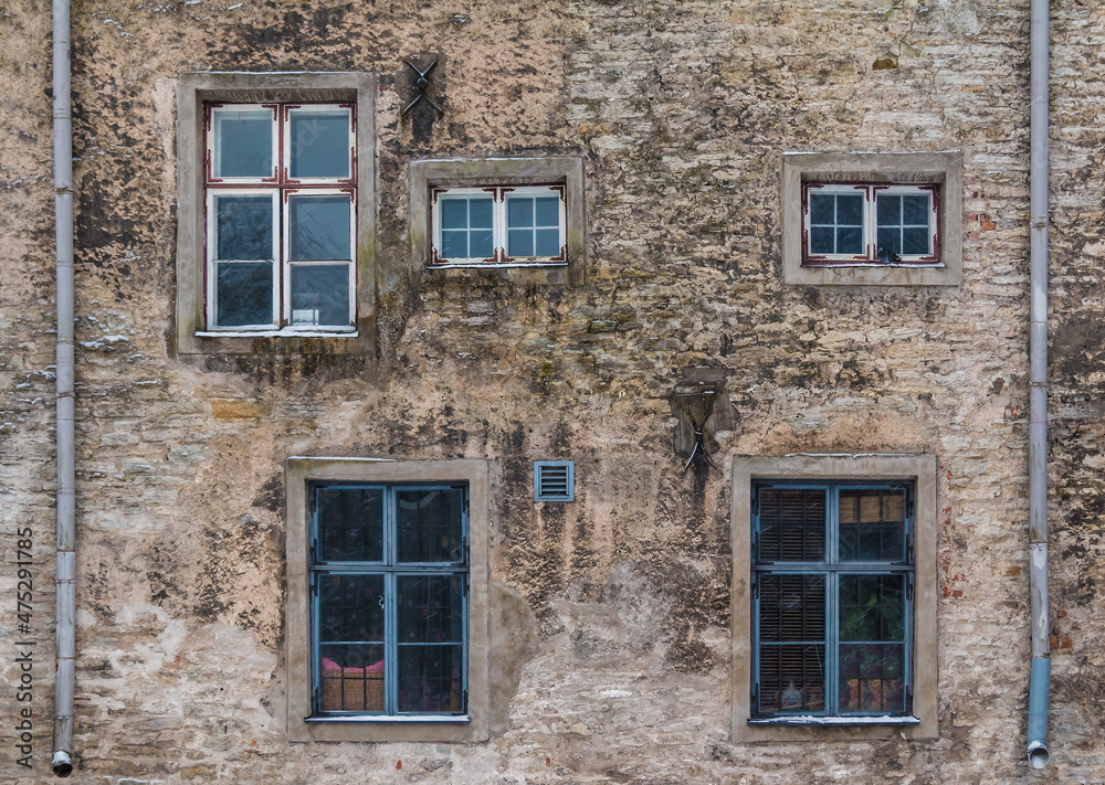 Several windows on facade of the urban historic building front view, Tallinn, Estonia
Several windows on facade of the urban historic building front view, Tallinn, Estonia