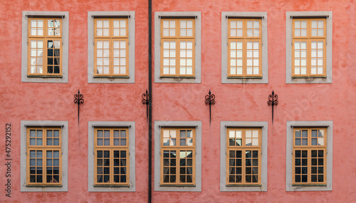 Many windows on facade of the urban historic building front view, Stockholm, Sweden
