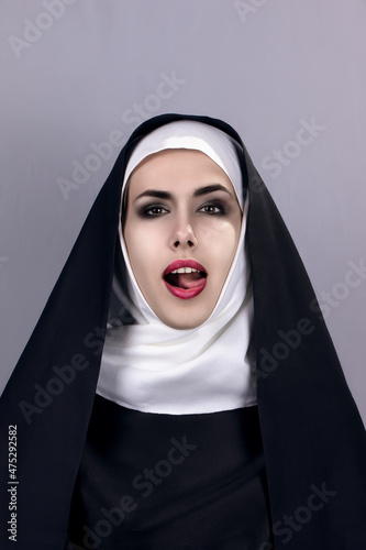girl nun tongue in mouth