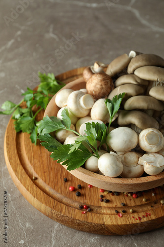 Concept of tasty food with mushrooms on gray textured background