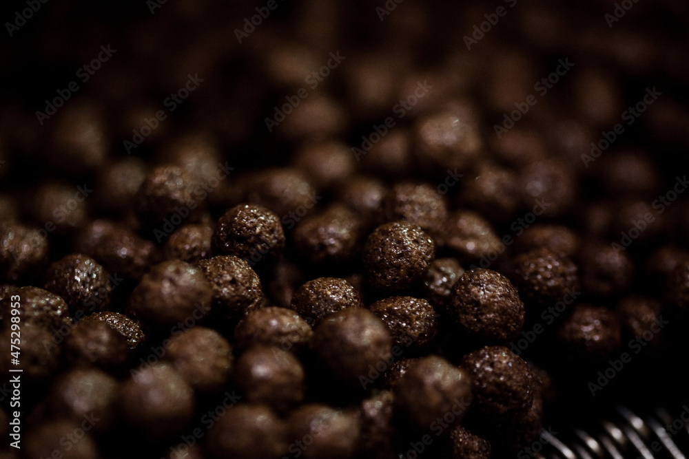 CEREAL AND COOKIE FACTORY. CLOSE UP AND DETAIL OOF PRODUCTION LINE. High quality photo CEREAL AND COOKIE FACTORY. CLOSE UP AND DETAIL OOF PRODUCTION LINE. High quality photo