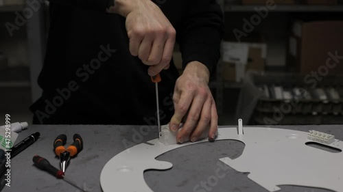 Detail of a man at working. Handmade manufacture.