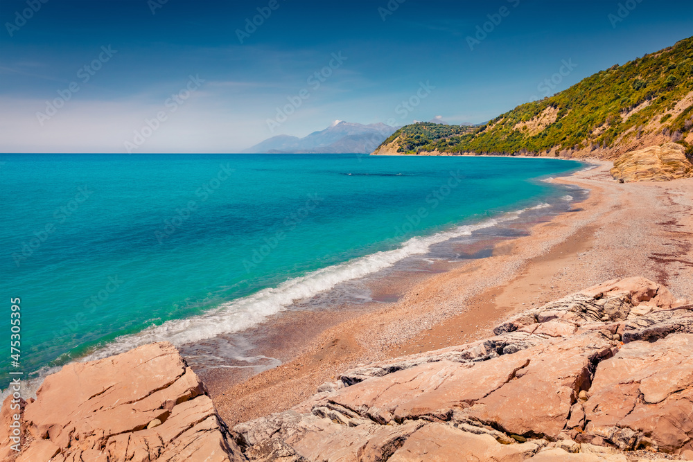 Rocky morning view of Lukove beach with endless horizon. Magnificent spring seascape of Adriatic sea. Spectacular outdoor scene of Albania, Europe. Beauty of nature concept background.