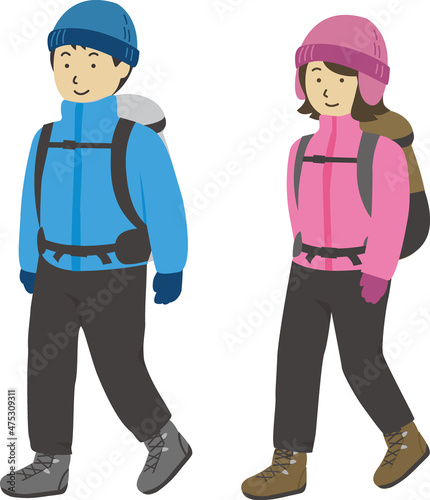 リュックを背負って歩く登山男女ペアセット(冬)1