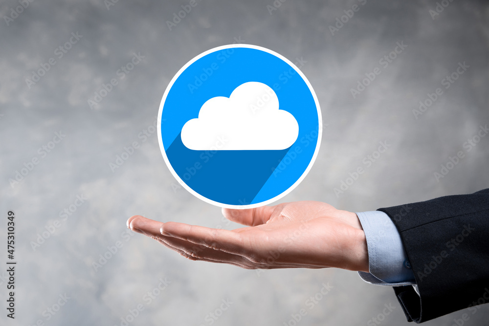 Businessman hold cloud icon.Cloud computing concept - connect smart phone to cloud. computing network information technologist with smart phone.Big data Concept.flat icons with long shadows Businessman hold cloud icon.Cloud computing concept - connect smart phone to cloud. computing network information technologist with smart phone.Big data Concept.flat icons with long shadows