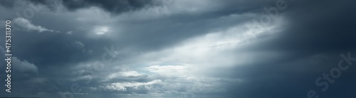 Dark ornamental clouds. Dramatic sky. Epic storm cloudscape. Panoramic image, texture, background, graphic resources, design, copy space. Meteorology, weather, thunderstorm. hurricane concepts