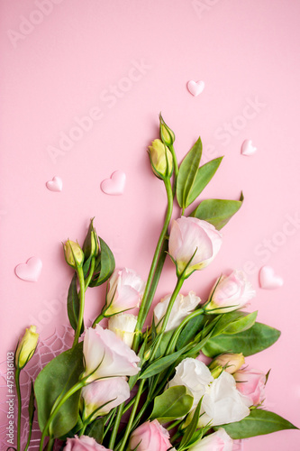 Fototapeta Naklejka Na Ścianę i Meble -  Festive bouquet of flowers for the beloved on a pink background. The concept of love congratulations on the wedding, March 8, Valentine's Day, Christmas and birthday. Copy space.