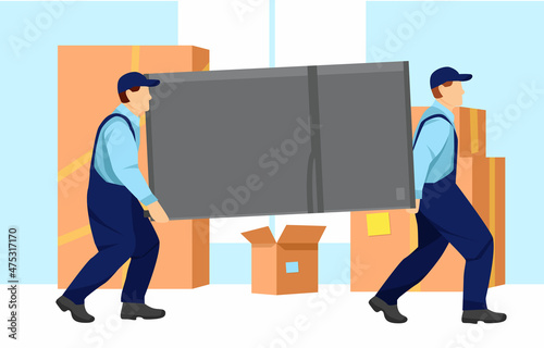 Movers carry a heavy refrigerator. Boxes with things are standing near the wall. Relocation. Transport company. Moving service. Cartoon vector illustration in flat style.
