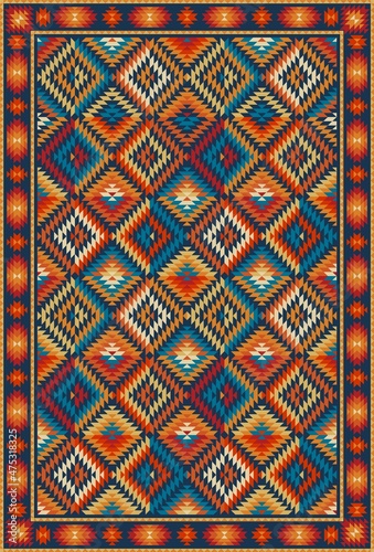 Colorful oriental carpet with geometric pattern