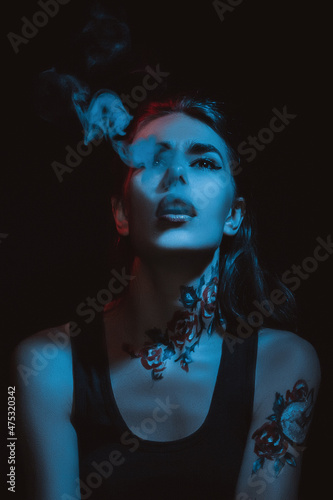 portrait of a woman with lips and smoke 