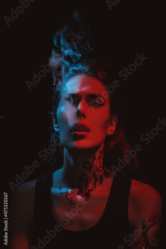 portrait of a woman with lips and smoke