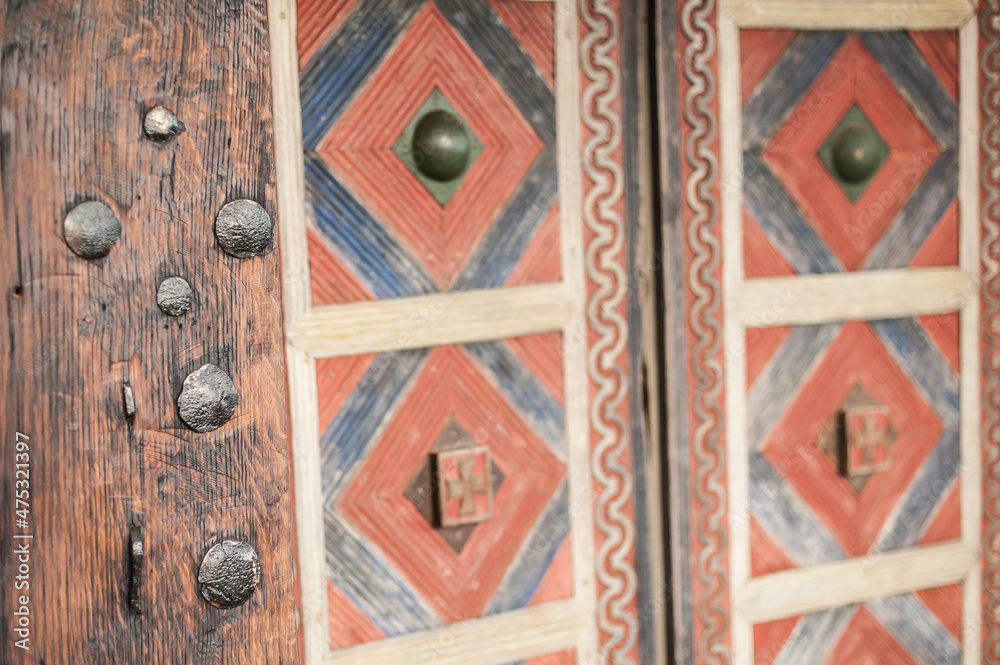 Abstract closeup detail view of decorative medieval wood metal door Abstract closeup detail view of decorative medieval wood metal door