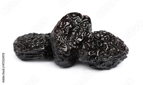 Sweet dried prunes on white background. Healthy snack