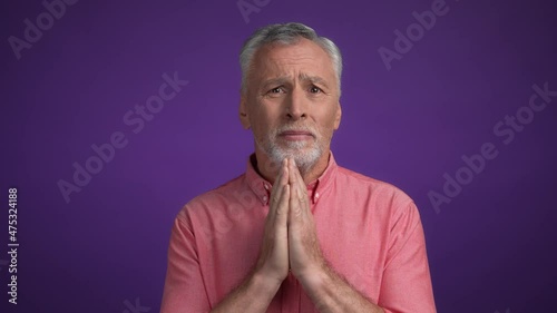Frustrated man please hand gesture isolated vivid color background photo
