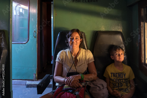 mather and son in a train in Sri Lanka