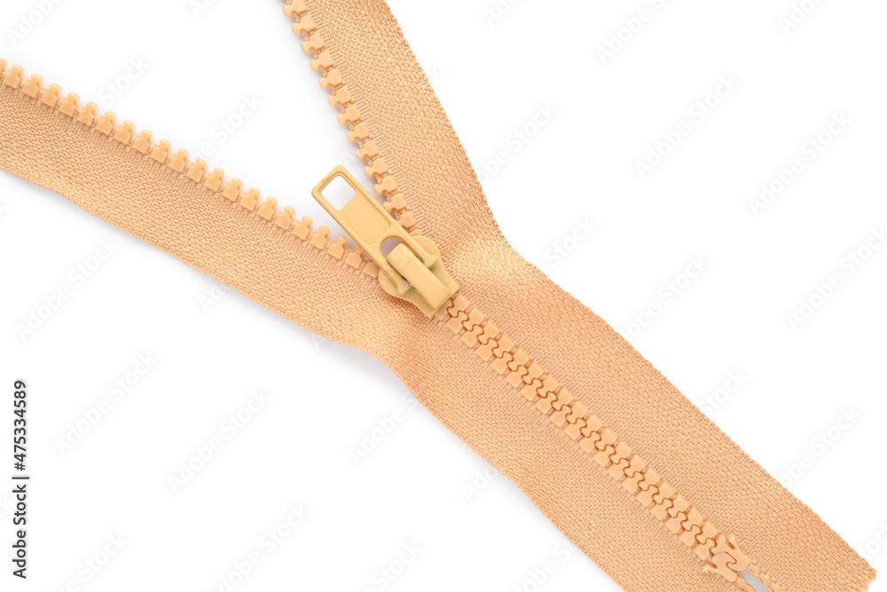 Beige zipper on white background, top view Beige zipper on white background, top view