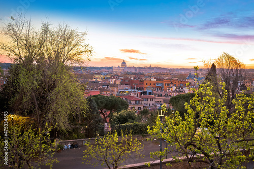 Fototapeta Naklejka Na Ścianę i Meble -  Rome. Colorful dusk view of Rome and Vatican rooftops and landmarks