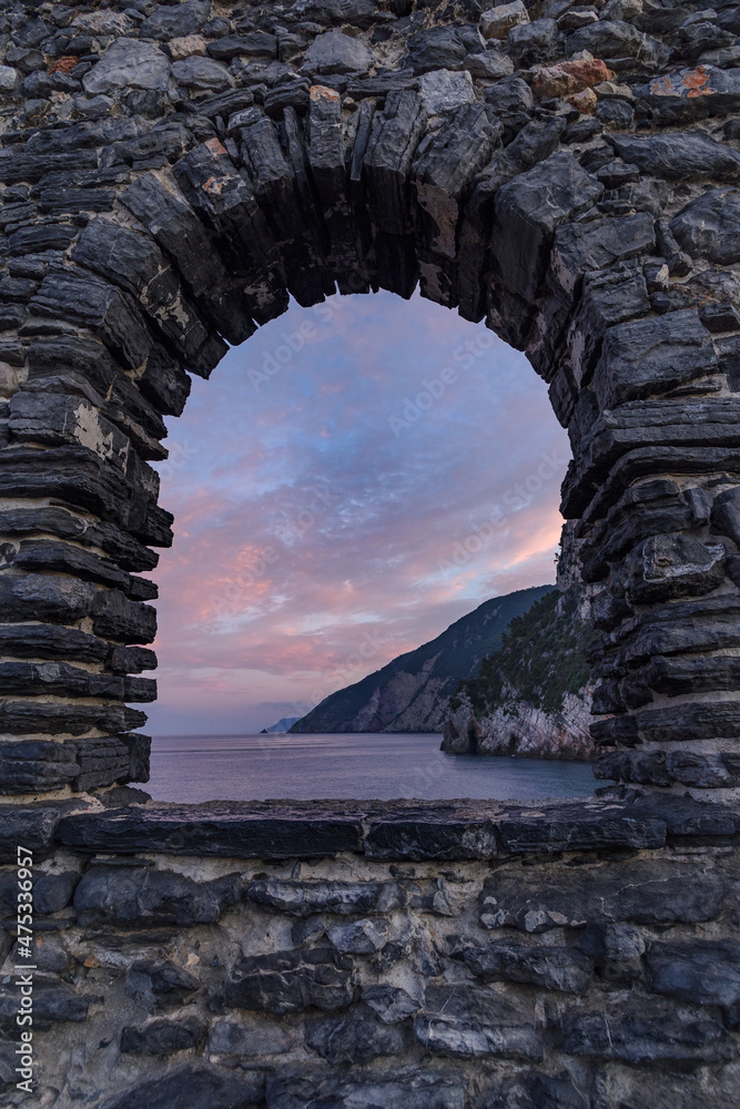 View of sea from arched window at Porto Venere, Liguria, Italy