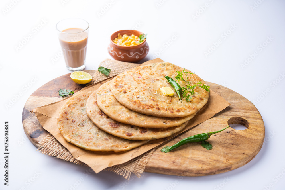 Paneer paratha is a popular North Indian flatbread made with whole wheat flour dough and stuffed with savory, spiced, grated paneer Paneer paratha is a popular North Indian flatbread made with whole wheat flour dough and stuffed with savory, spiced, grated paneer