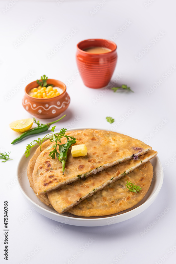 Paneer paratha is a popular North Indian flatbread made with whole wheat flour dough and stuffed with savory, spiced, grated paneer Paneer paratha is a popular North Indian flatbread made with whole wheat flour dough and stuffed with savory, spiced, grated paneer