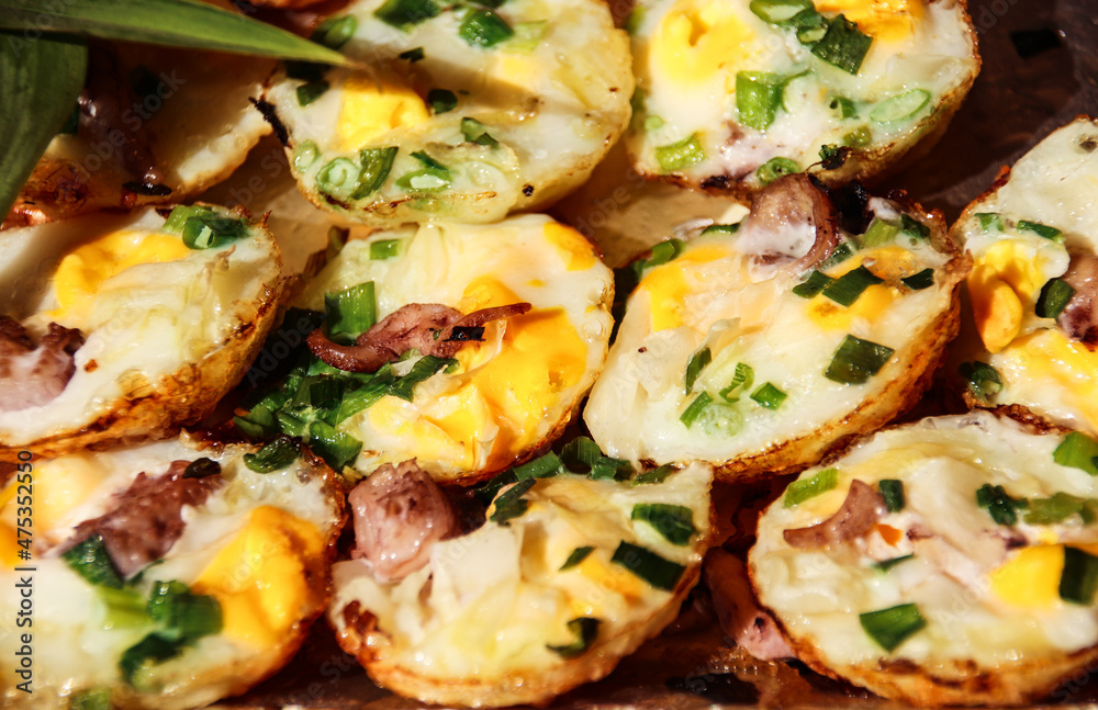 Close up of Vietnamese Grilled Quail Eggs or Trung Cut Nuong which is popular authentic local street food in Can tho, Vietnam Close up of Vietnamese Grilled Quail Eggs or Trung Cut Nuong which is popular authentic local street food in Can tho, Vietnam
