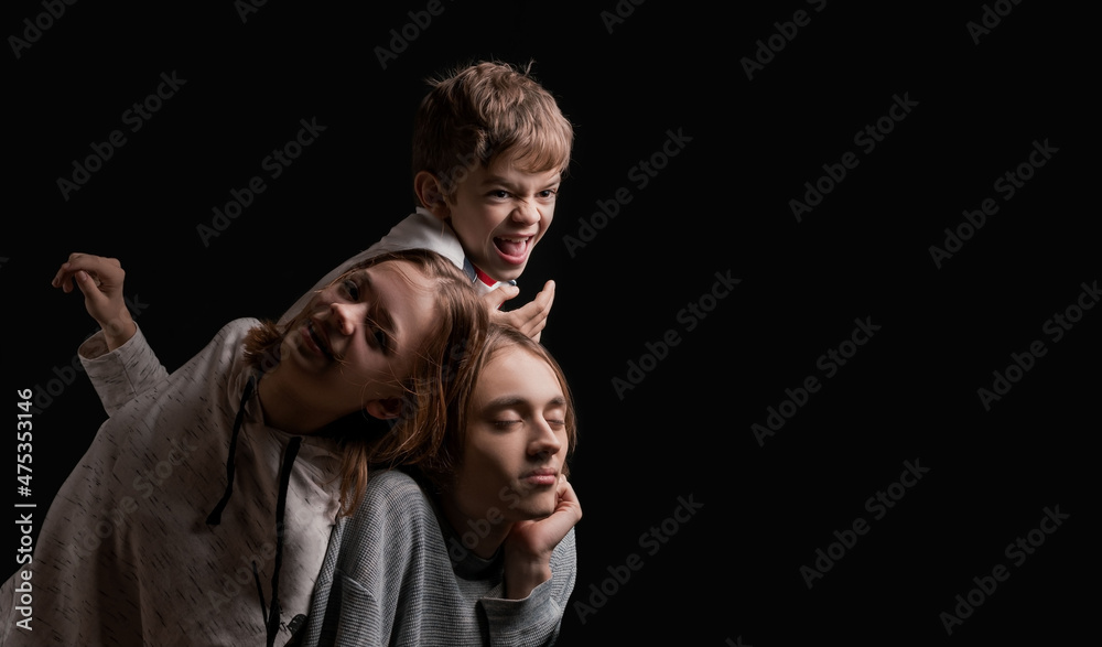 A girl plays with her younger brother A girl plays with her younger brother
