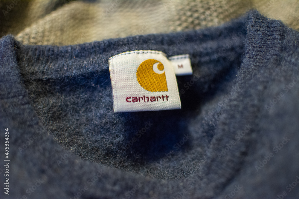 ANTWERP, BELGIUM - Nov 17, 2021: Close-up shot of Carhartt brand tag or  label in garment Stock Photo | Adobe Stock