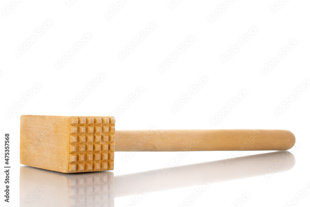 One wooden hammer for the kitchen, close-up, isolated on white.