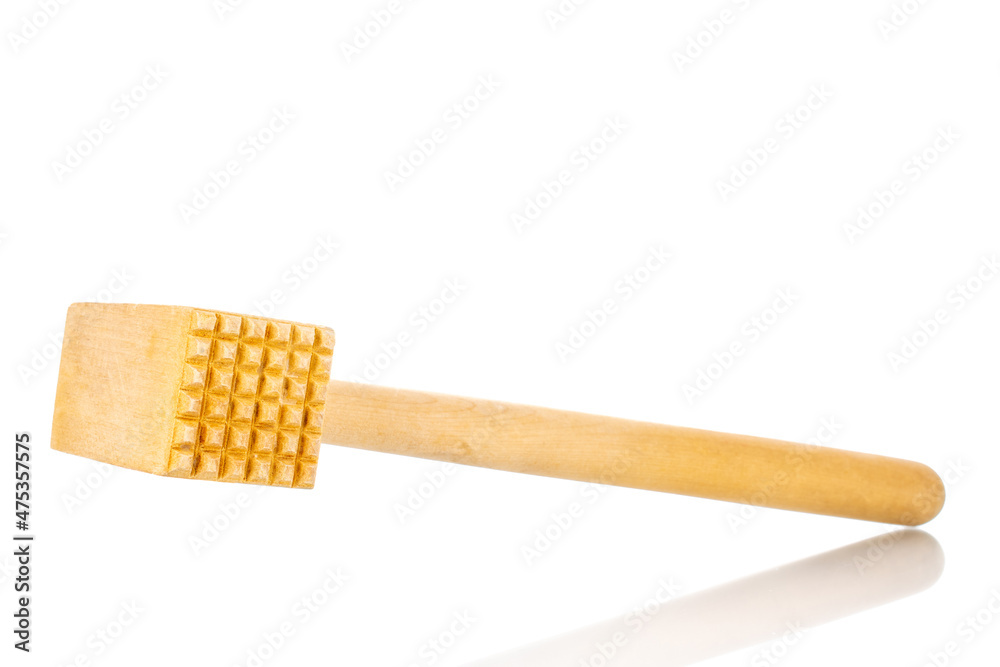 One wooden hammer for the kitchen, close-up, isolated on white. One wooden hammer for the kitchen, close-up, isolated on white.