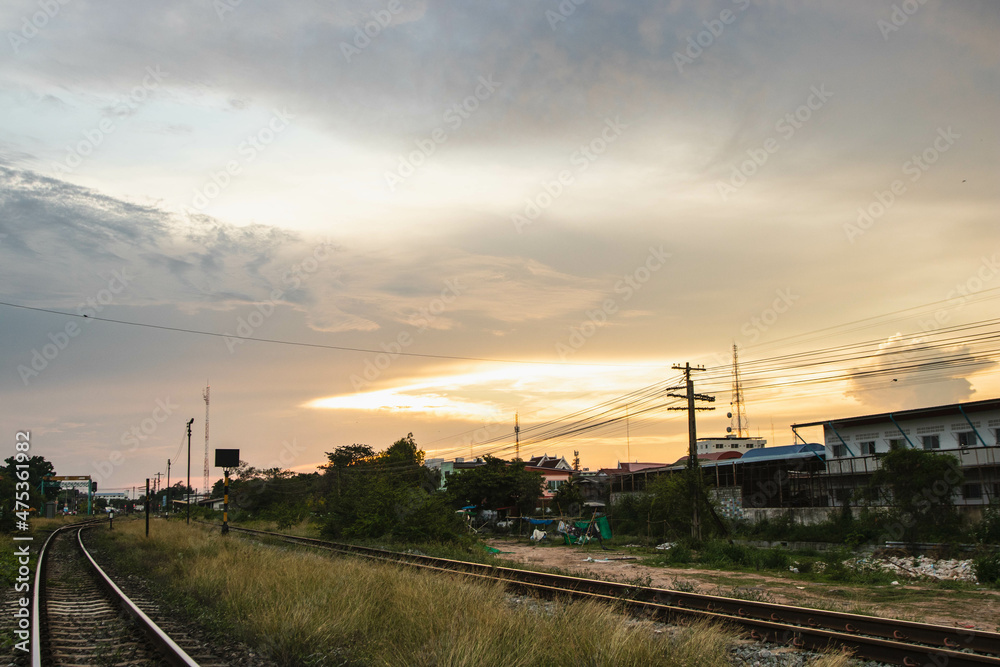 Railroad tracks with sunset in rural, Thailand Railroad tracks with sunset in rural, Thailand