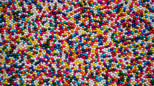 Colorful pattern background with multi-colored beads.