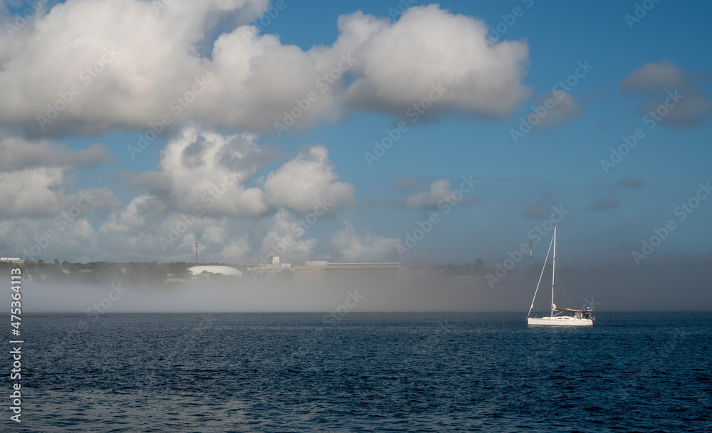 a strip of fog in Halifax Bay. Nova  Scotia. Canada