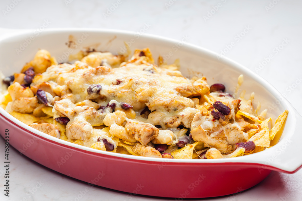 nachos with chicken meat, red beans and cheese