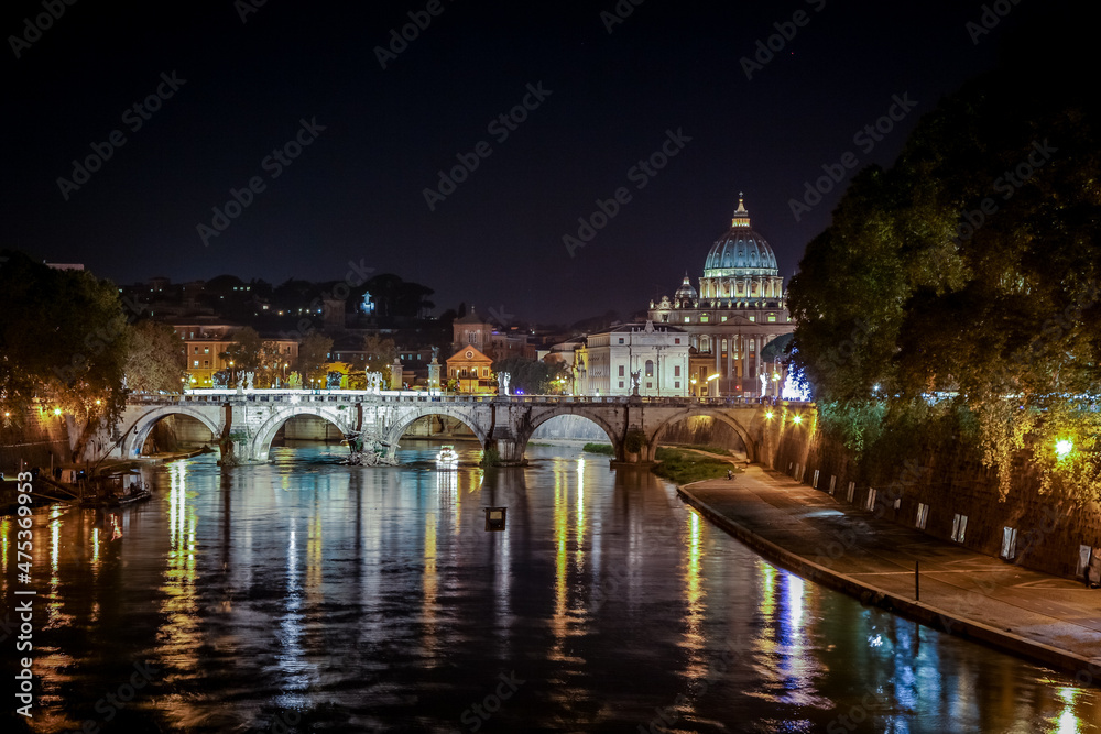 View of the Victor Emmanuel bridge and St. Peter's Cathedral in the evening. Rome, Lazio, Italy