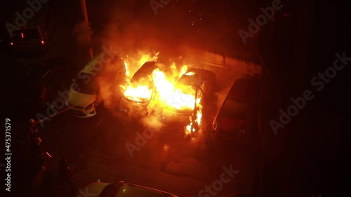 firefighters extinguish burning cars, night video