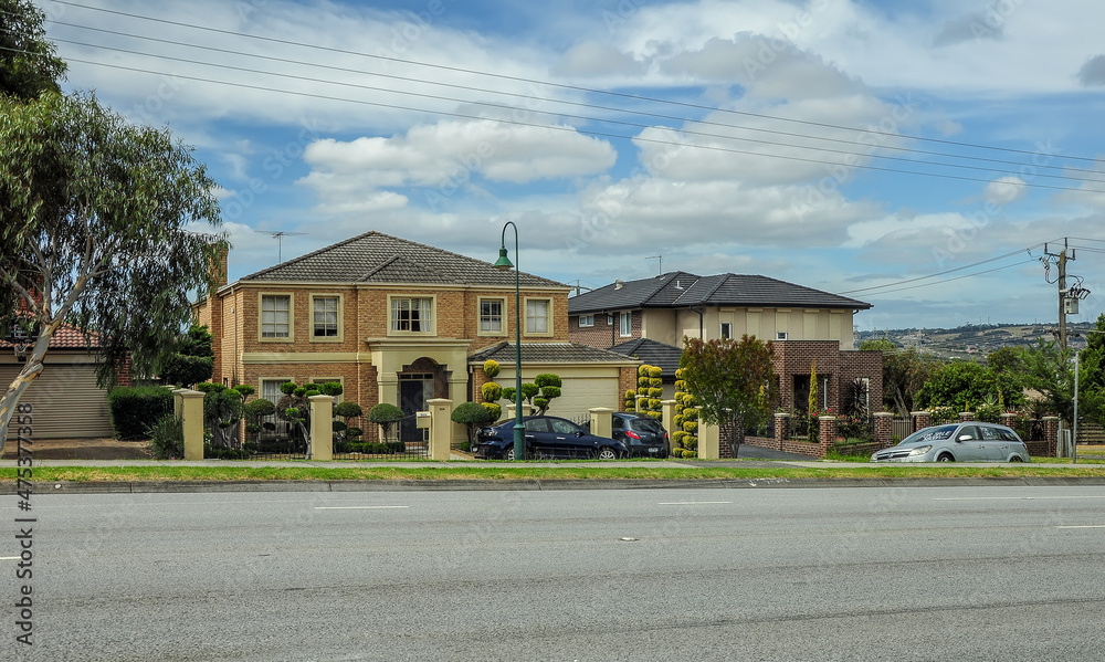 View of residential buildings from the car window while driving in Victoria Australia. View of residential buildings from the car window while driving in Victoria Australia.
