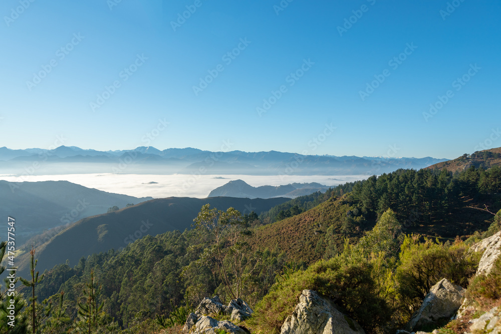 views of the Picos de Europa mountains with fog in the distance