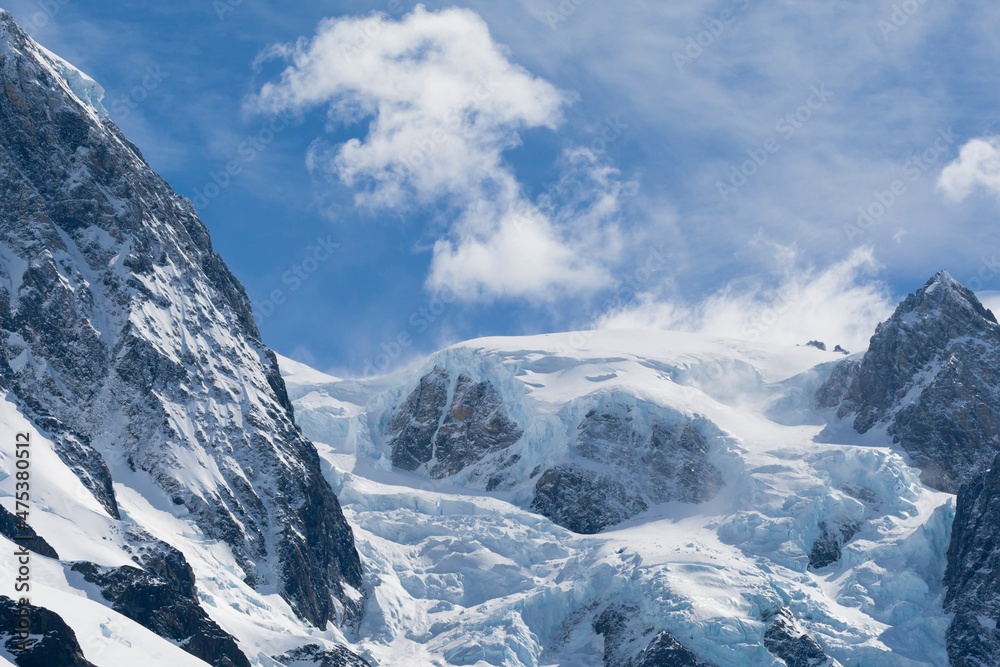 Obraz premium Southern Ocean, South Georgia, Drygalski Fjord. Views of the mountains along the edges of the fjord with small glaciers coating them.
