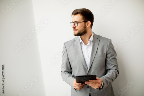 Young modern businessman us...