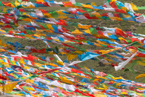 Prayer flags in Simila Mountain, Gyantse County, Tibet, China photo