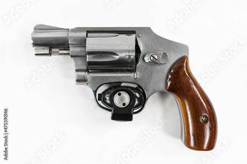 Фотография Close up of 38 caliber revolver hand gun with safety trigger lock