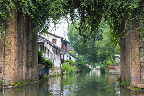 Stone bridge and traditional houses on the Grand Canal  Shaoxing  Zhejiang Province  China