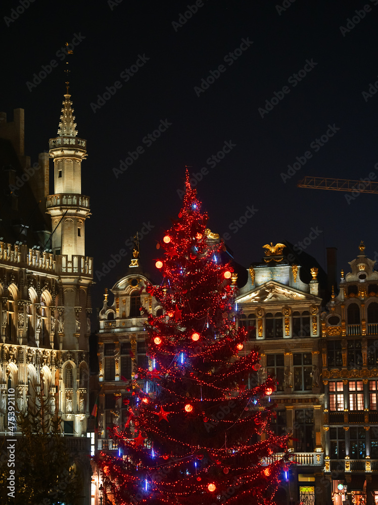 Winter holidays. The amazing Christmas tree in red color decorations from Grand Place in Bruxelles, Belgium.