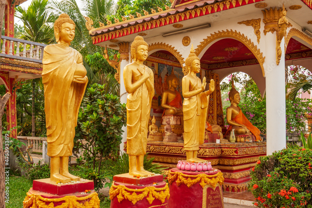 Buddhist statues around Pha That Luang, (Great Stupa in Lao) is a Buddhist stupa, Vientiane, Capital of Laos, Southeast Asia