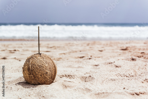 Drinking fresh coconut on a beach vacation