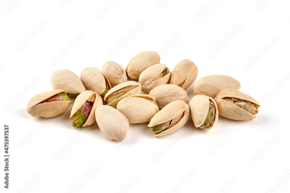 Pistachio nuts, isolated on white background. Close-up. Pistachio nuts, isolated on white background. Close-up.