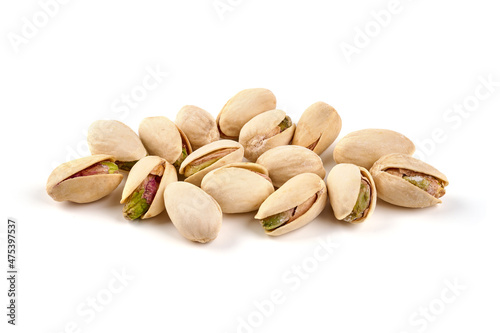 Pistachio nuts, isolated on white background. Close-up.