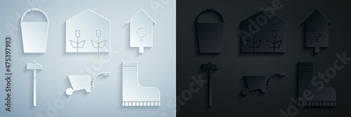 Set Wheelbarrow, Retro wall watch, Hammer, Waterproof rubber boot, Home greenhouse and plants and Bucket icon. Vector
